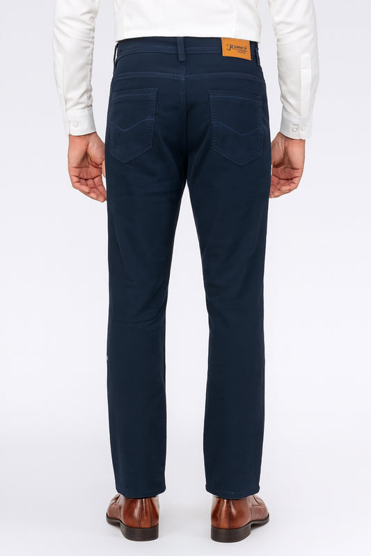 Navy blue pants worn by a person on a white background